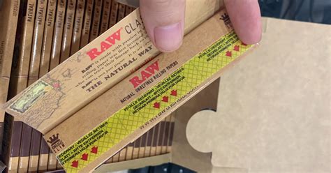 How to Roll a Raw Paper: A Philosophical Journey into the Art of Folding Reality